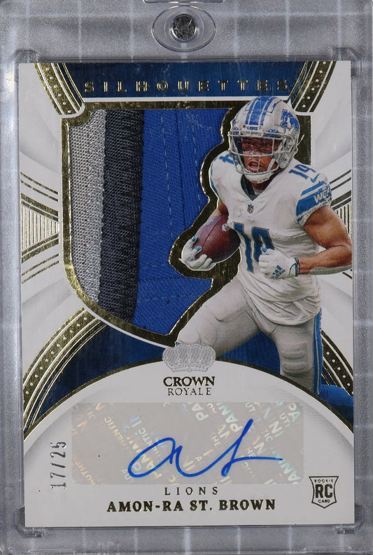 2021 Panini Chronicles #CRS-AST Amon-Ra St. Brown Crown Royale Auto Prime #/25